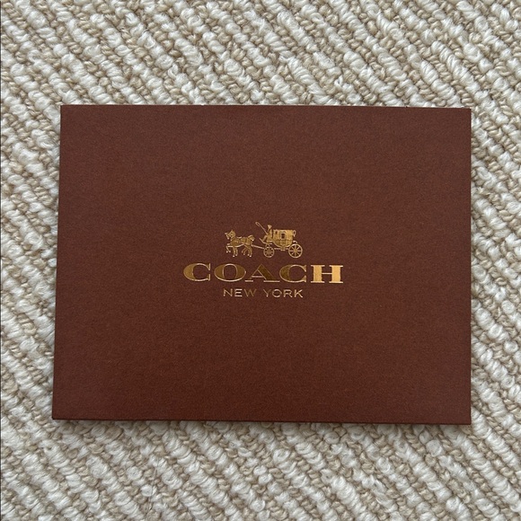 Coach Silver and Pink Charm Key Holder Comes with Jewelry care booklet and pouch - Picture 3 of 5